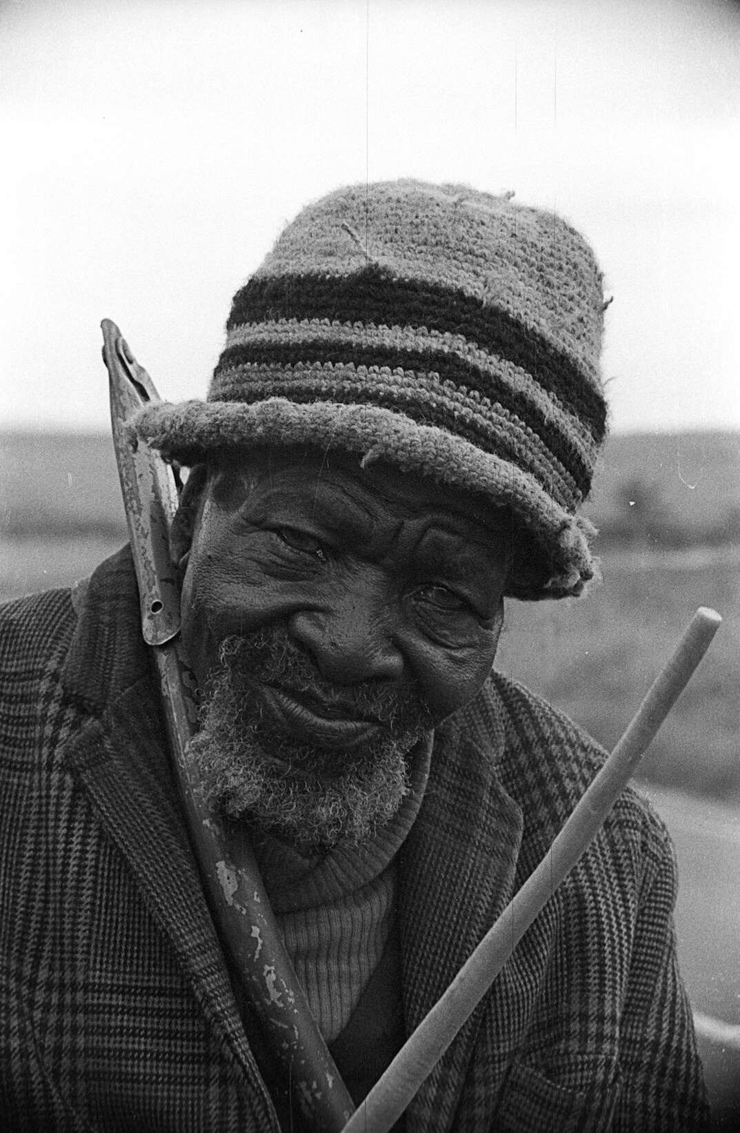 Portrait of a bearded Black man smiling